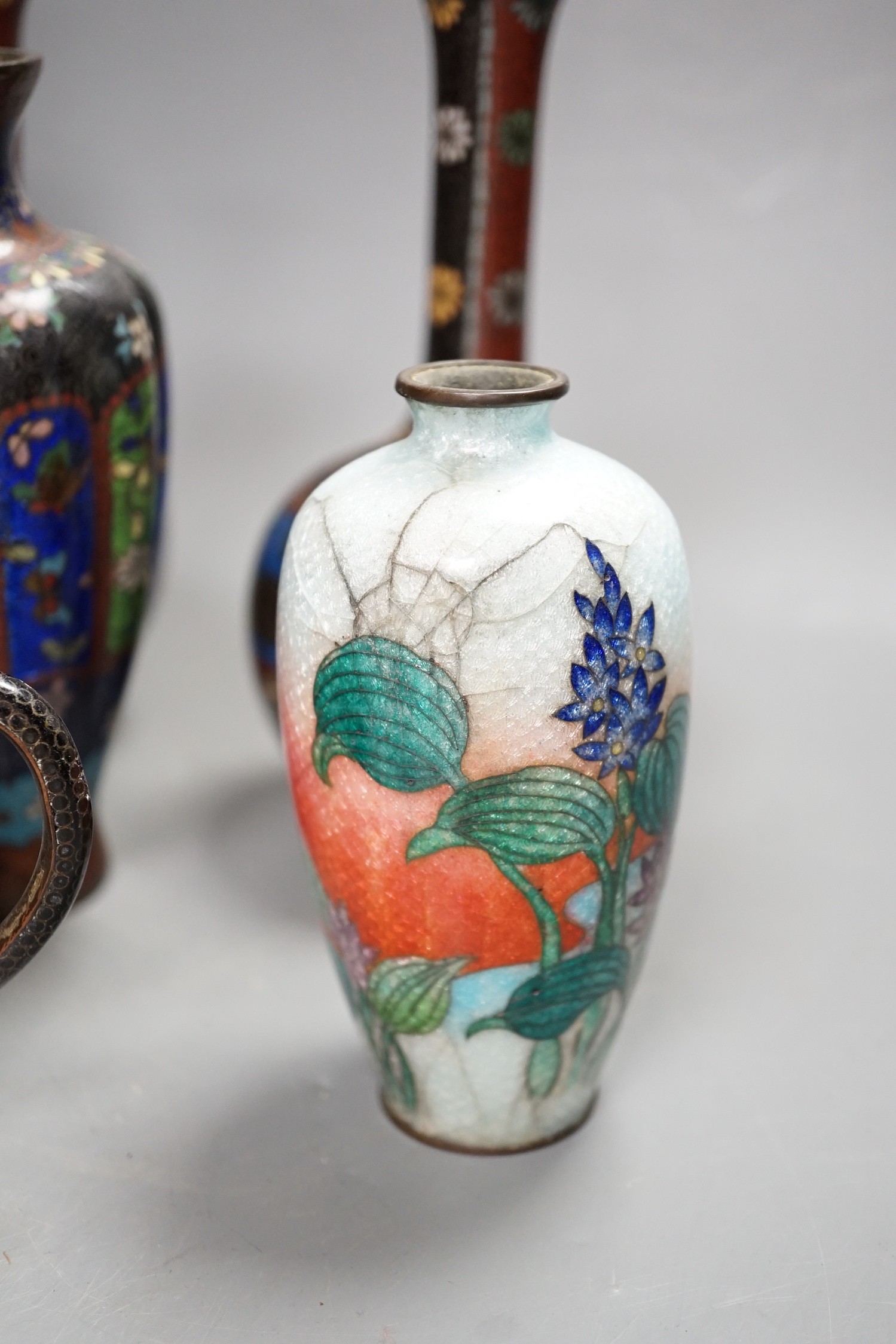 A group of Japanese cloisonné enamel vases and a teapot, Meiji, 24cm high